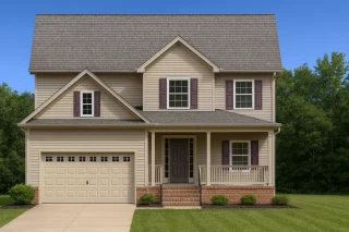 Front view of a Traditional Suburban Colonial Revival style house featuring horizontal siding, dark shutters, and a double garage