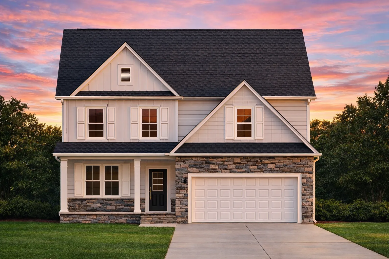 Front elevation of New American Traditional house with horizontal lap siding, stone veneer, gabled roof, and two-car garage