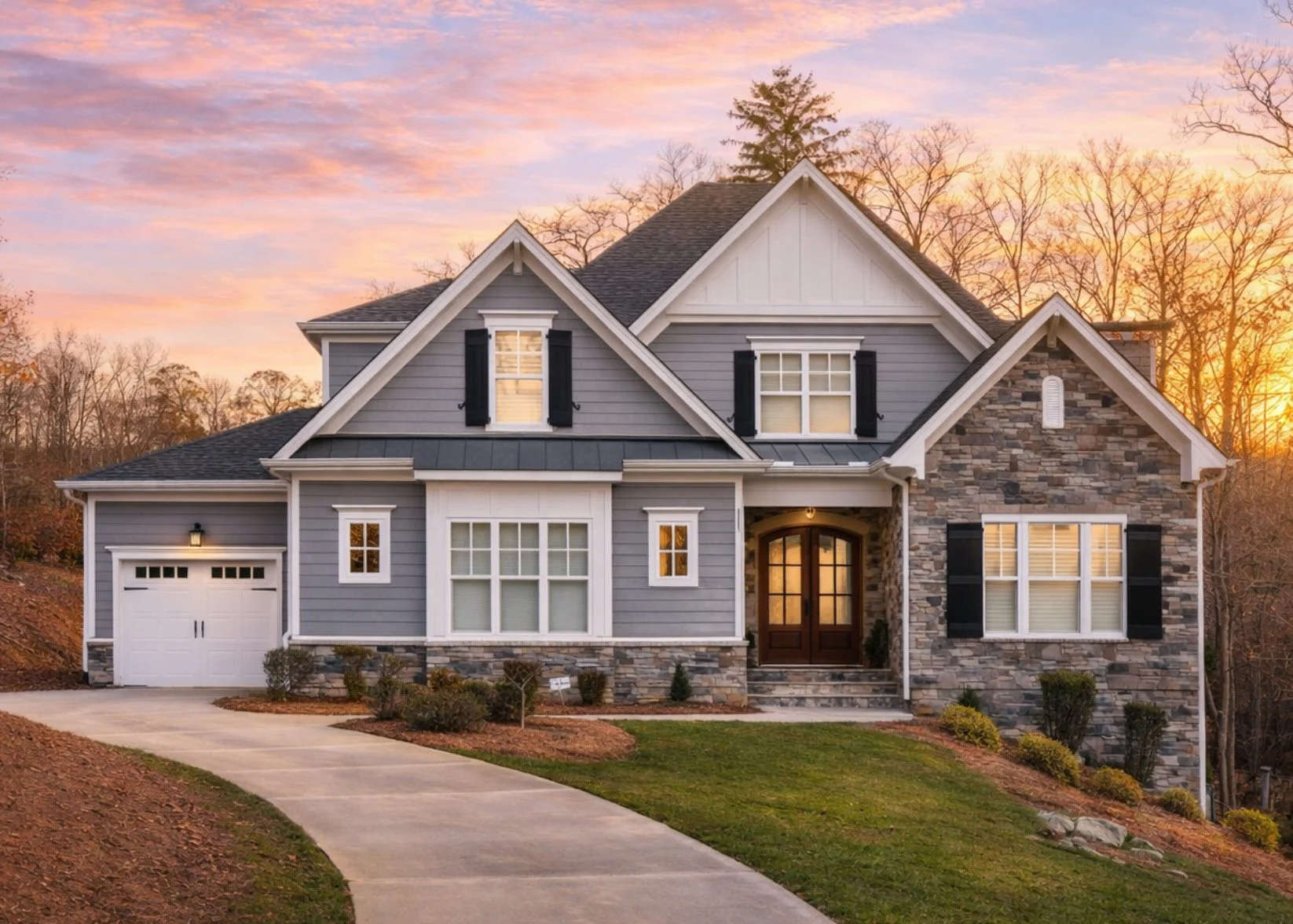 Front elevation of a New American style home with lap siding, board-and-batten details, stone accents, and a welcoming covered entry