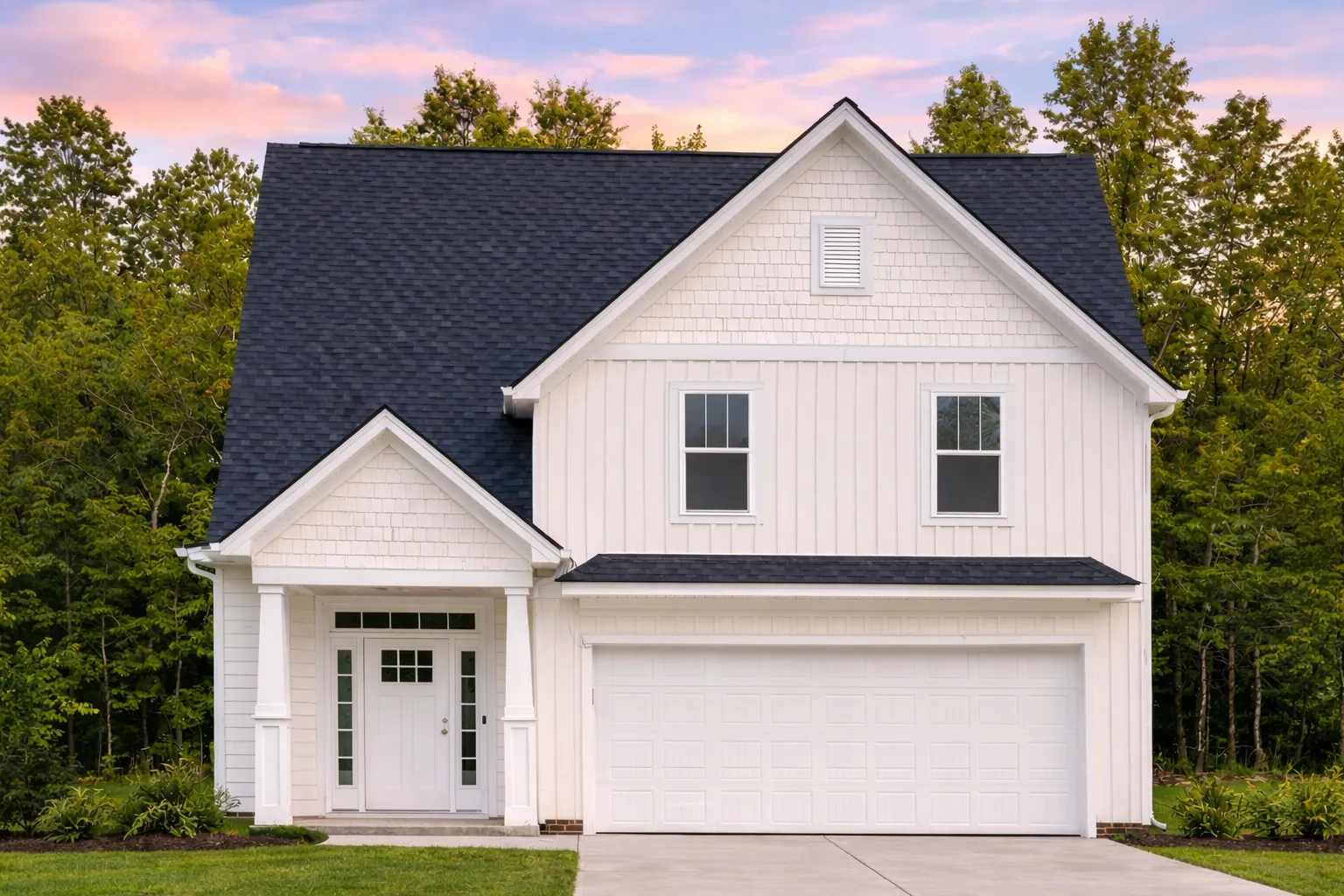 House Plans 23 Front view of a Modern Farmhouse style home featuring board and batten siding, stone porch accents, and a symmetrical 2-story elevation with double garage
