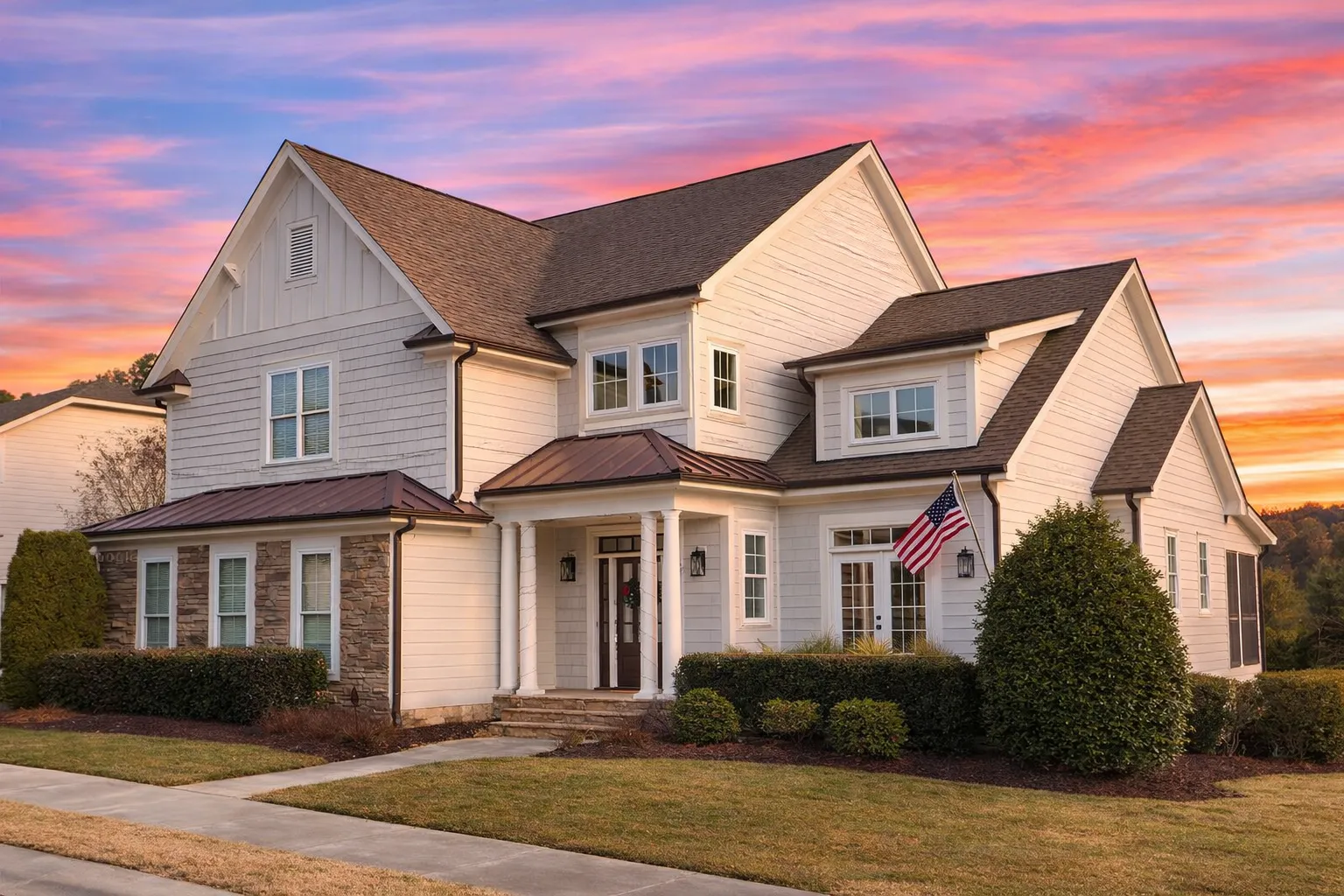 Front elevation of a Modern Farmhouse style home featuring board-and-batten siding, stone accents, steep gabled roof, and symmetrical New American design