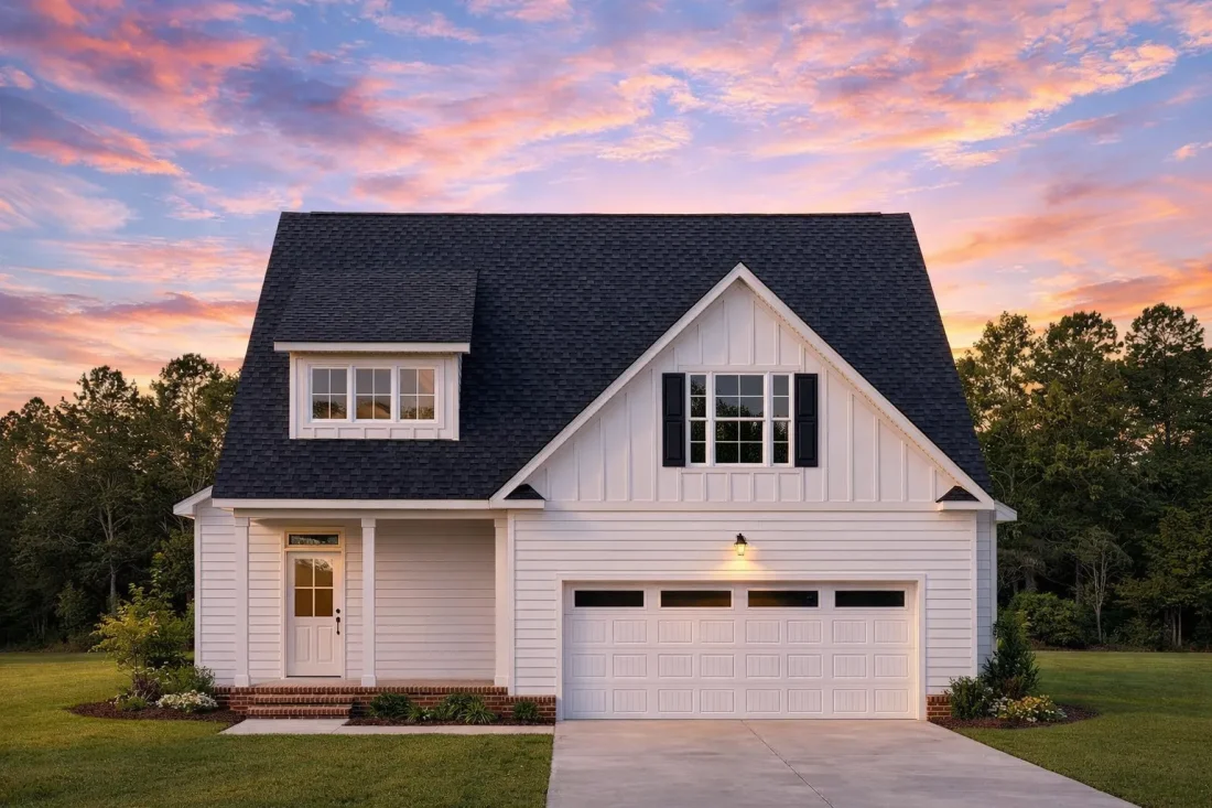 Front view of a Modern Farmhouse featuring board and batten siding, brick accents, and a welcoming gabled roofline with dormer window