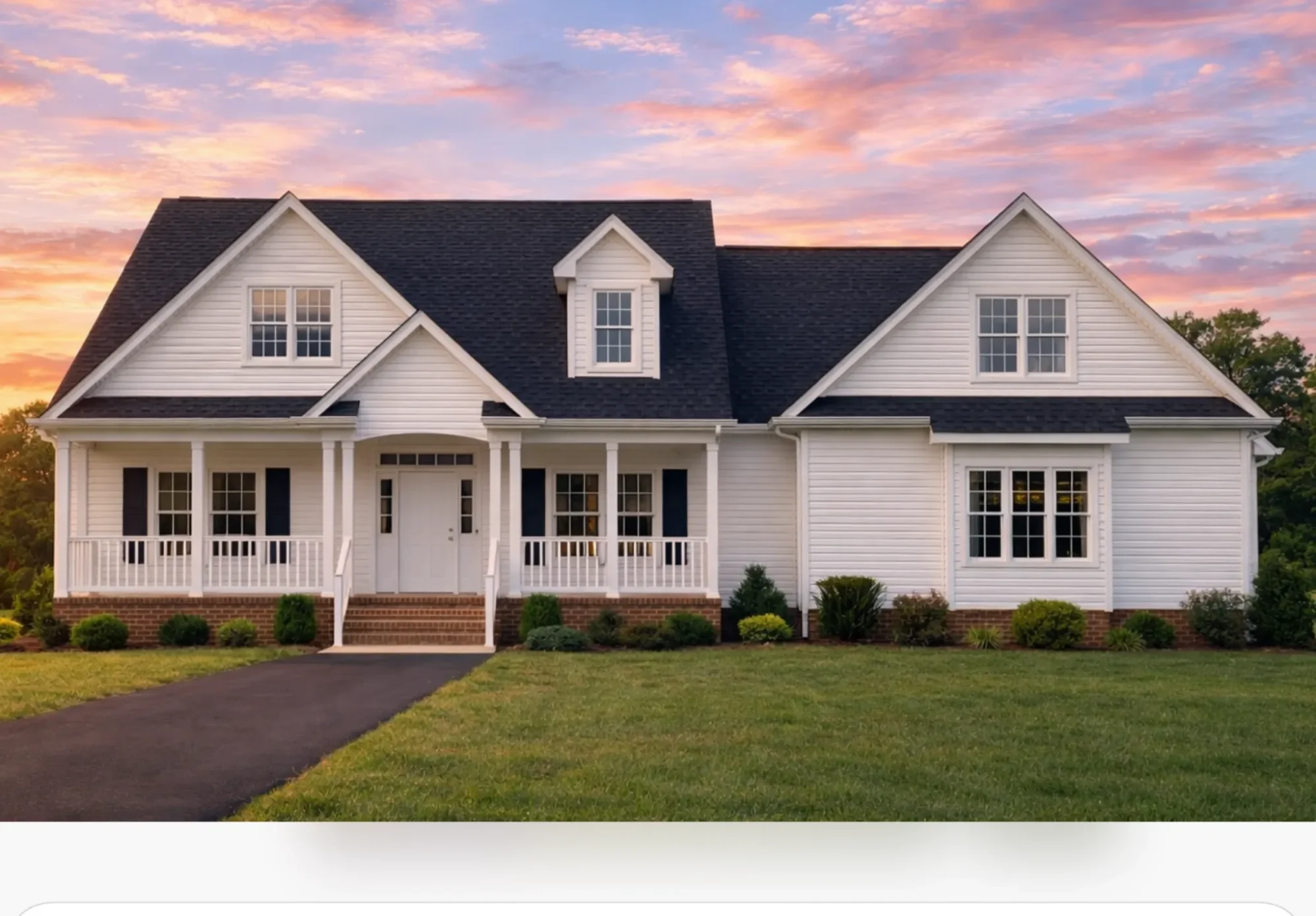 Front view of a Traditional Farmhouse with horizontal siding, board and batten details, stone skirting, and a welcoming covered porch entry