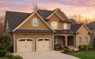 Front elevation of a New American modern traditional house featuring brick, stone, and horizontal siding