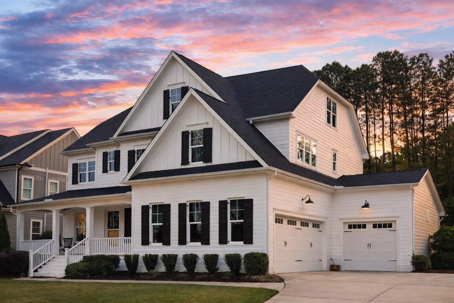 Garage Apartment Plans 9 Front elevation of a New American Traditional style home featuring horizontal lap siding, board and batten accents, symmetrical Colonial façade, and covered front porch