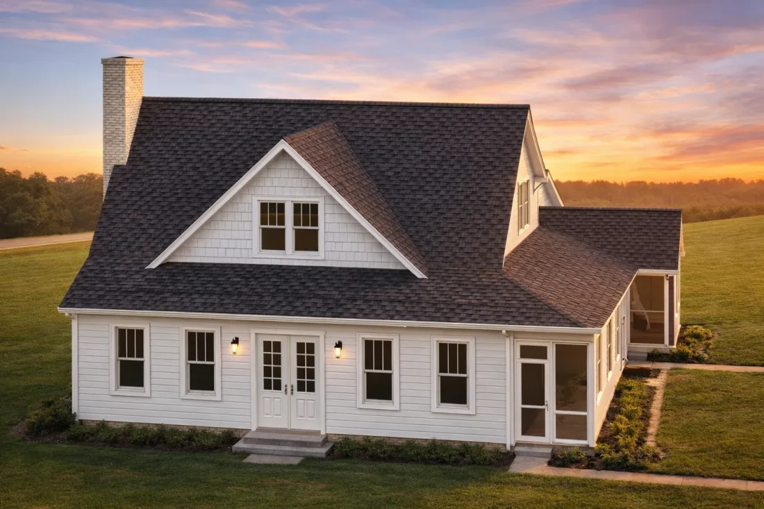 Front view of Modern Farmhouse style home with board and batten siding, brick foundation, and spacious covered porch entry