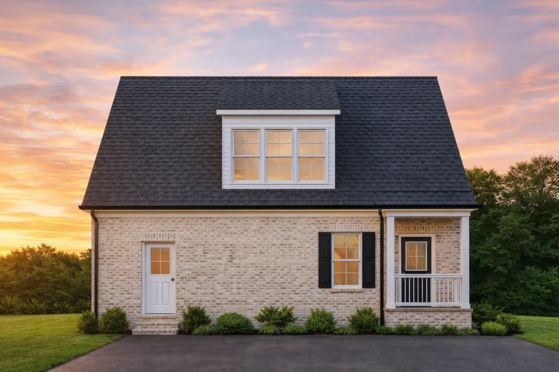 Front elevation of a Traditional Brick garage apartment with Neo-Colonial proportions, gabled rooflines, and classic suburban detailing