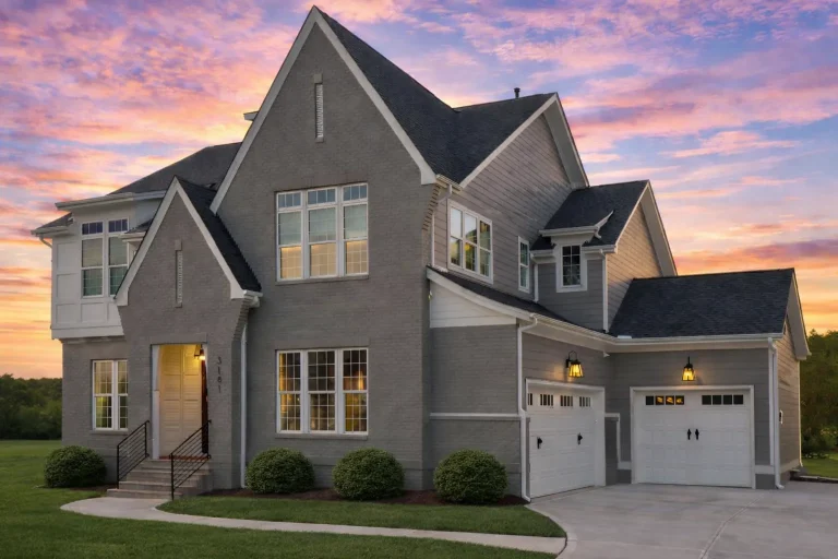 Front elevation of New American Modern Traditional house with steep gables, horizontal lap siding, symmetrical windows, and covered entry