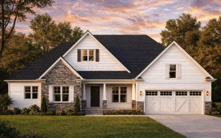 Front view of Modern Farmhouse style home featuring board and batten, horizontal siding, stone accents, and gable rooflines with a two-car garage