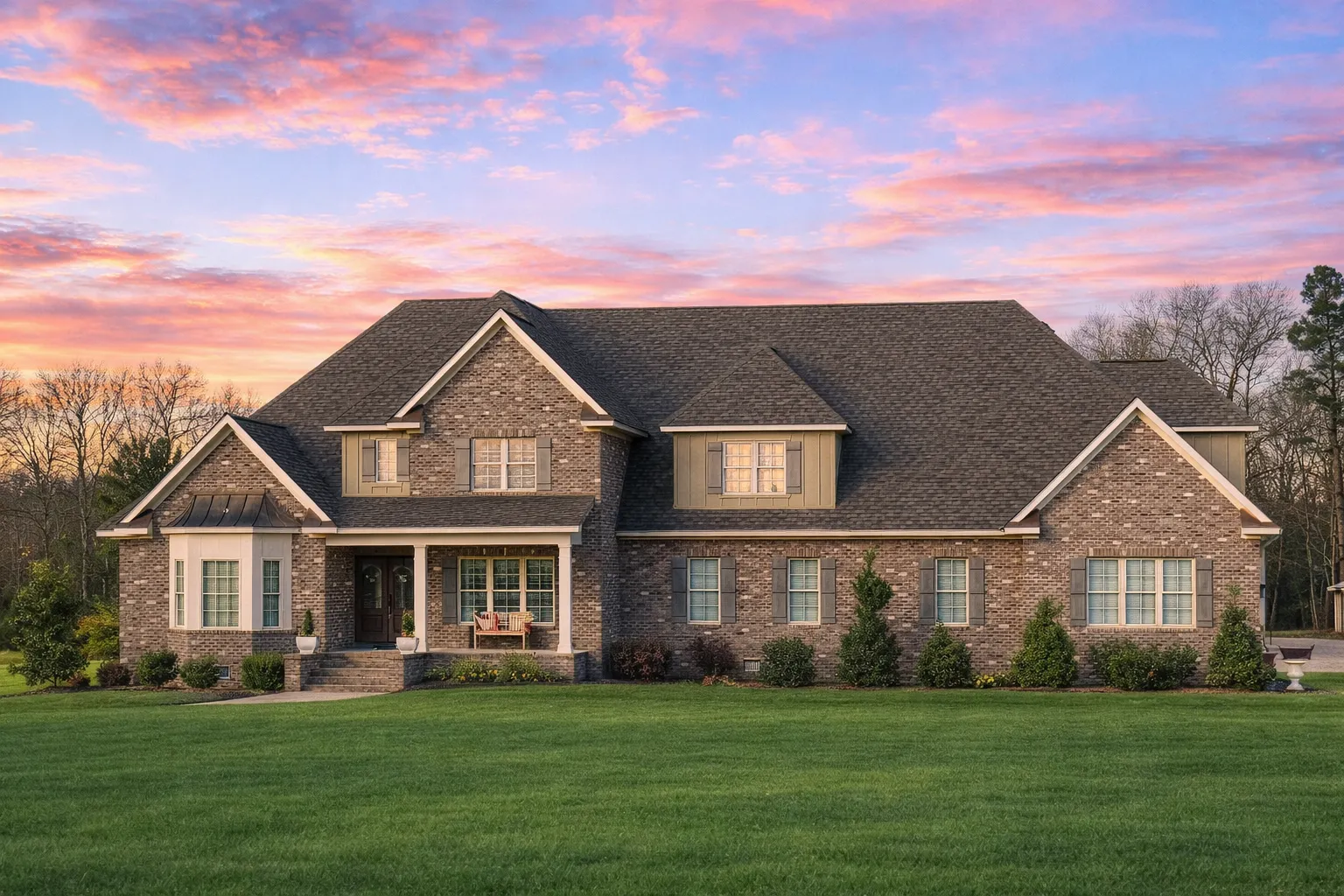 Mediterranean House Plans 9 Front elevation of a Traditional Colonial New American style home with red brick exterior, multi-gabled roof, and balanced window layout