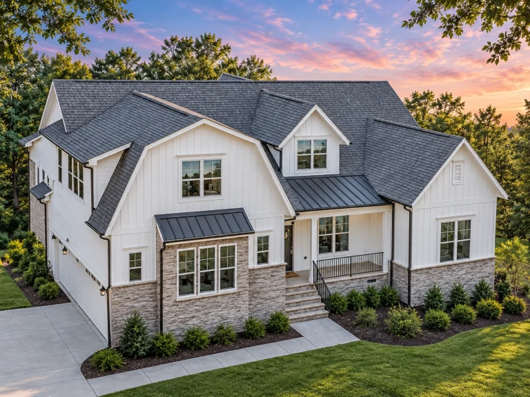Conventional House Plans 25 Front exterior view of a Modern Farmhouse New American style home featuring board and batten siding, brick accents, gabled rooflines, and a covered porch