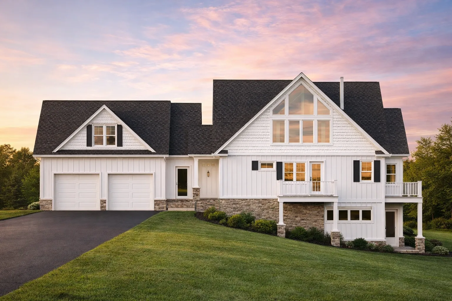 Front elevation of a New American modern traditional home with horizontal lap siding, board-and-batten gables, and a stone-accented covered entry porch