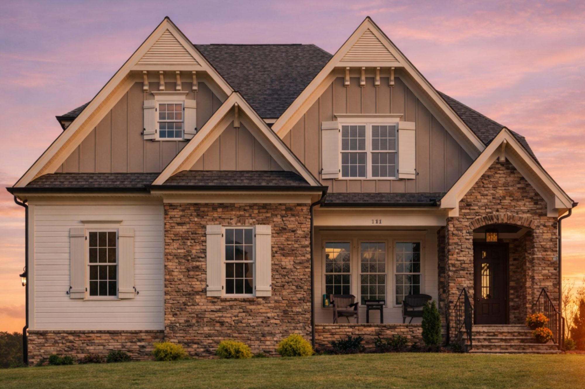 Front elevation of a New American farmhouse-style home featuring board and batten siding, stone accents, black shutters, and a welcoming covered entry