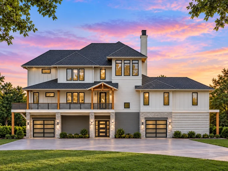 Front elevation of a Transitional Modern Farmhouse featuring stone accents, horizontal siding, board and batten details, and a three-car garage with elevated entry steps