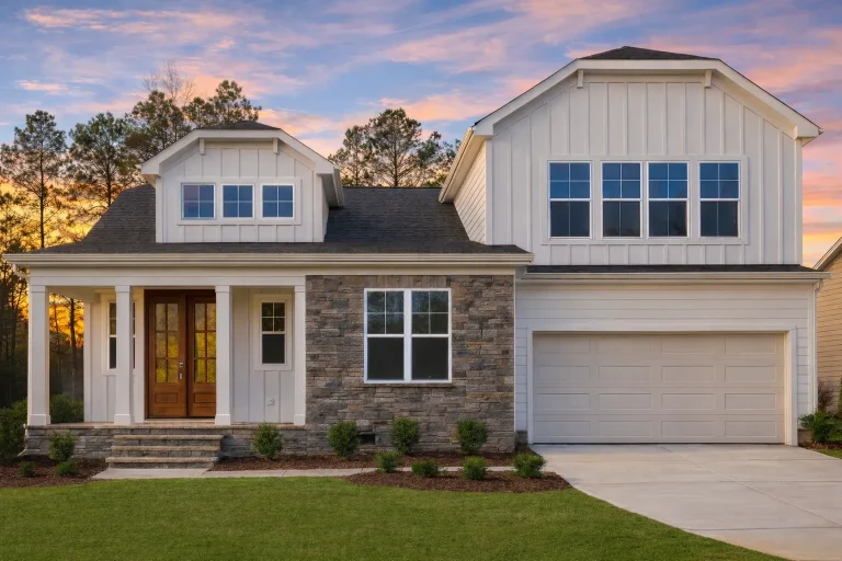 Split Garage House Plans 5 Front elevation of a New American style two-story home featuring board and batten siding, stone accents, symmetrical windows, and an attached two-car garage