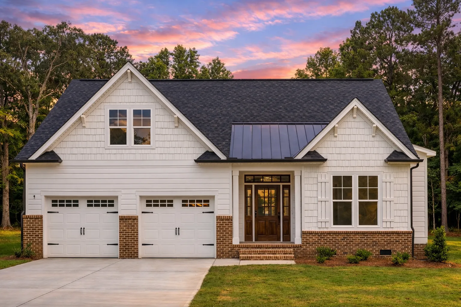 Front elevation of a Traditional Craftsman New American style home featuring board and batten, lap siding, and stone accents