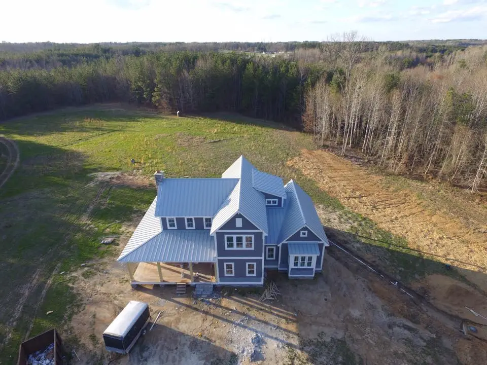 Farmhouse Home Plan with 2 Floors and 4 Bedrooms (1)