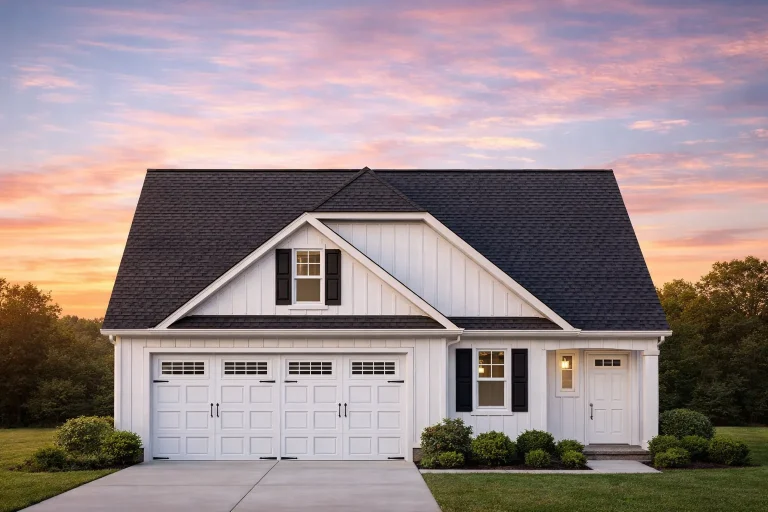Front elevation of a Traditional Suburban Craftsman style home featuring horizontal lap siding, board-and-batten accents, dormers, and a two-car garage