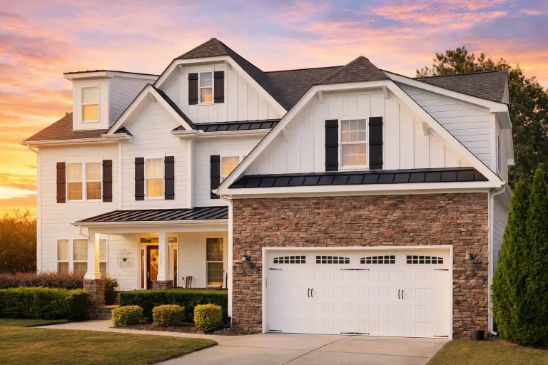 Front elevation of a New American Modern Traditional house featuring board and batten siding, horizontal lap siding, stone accents, and an attached two-car garage