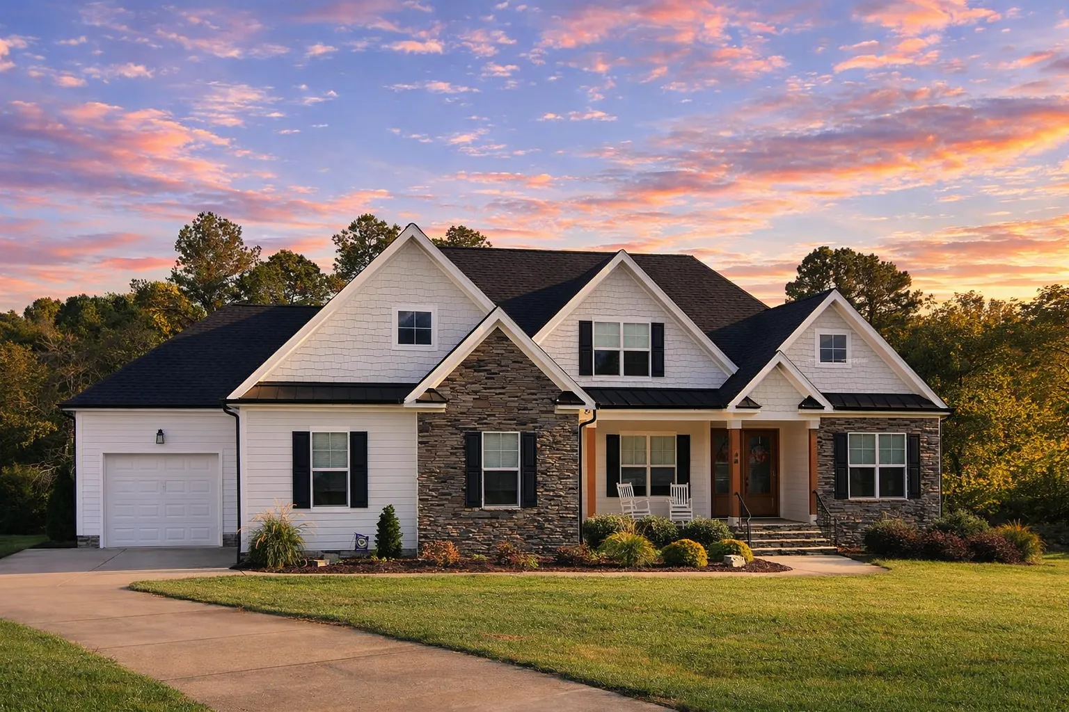 Front elevation of a Modern Farmhouse style home featuring white horizontal siding, black shutters, multiple gables, and a welcoming covered front porch