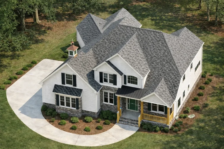 Front elevation of a New American Modern Traditional house with horizontal siding, stone accents, gabled rooflines, and a welcoming covered porch