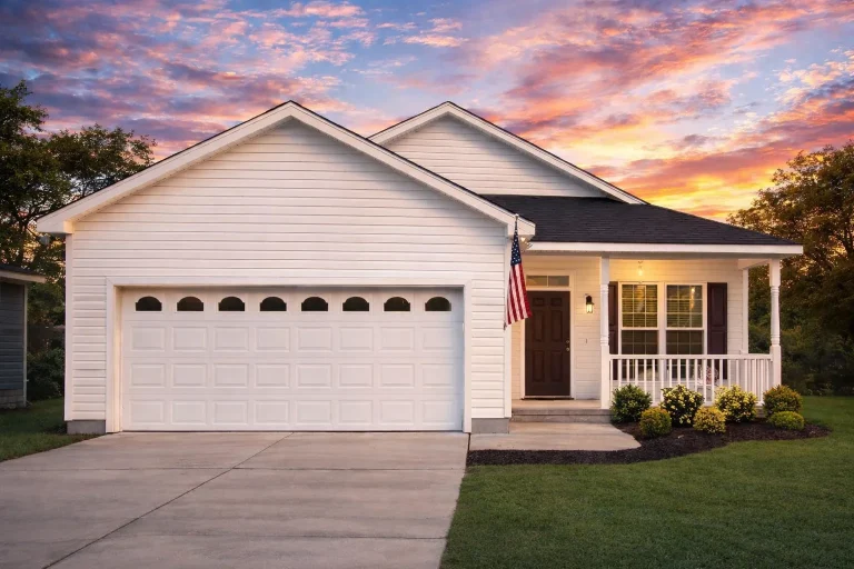 Traditional Ranch style home with horizontal siding, shake gable detailing, stone column bases, and a covered entry