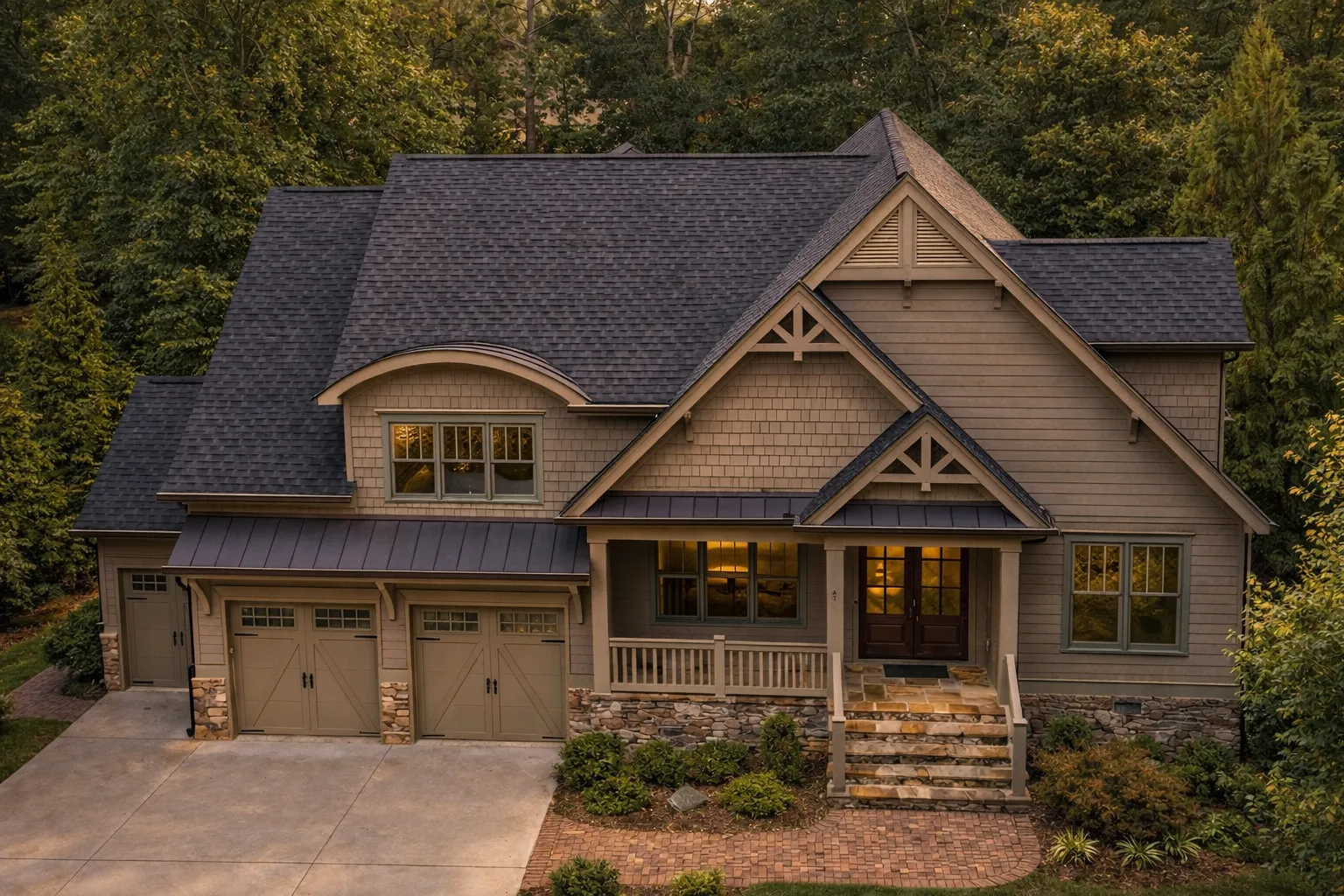 Front elevation of a New American Craftsman style home with shingle accents, horizontal siding, stone base, and covered front porch