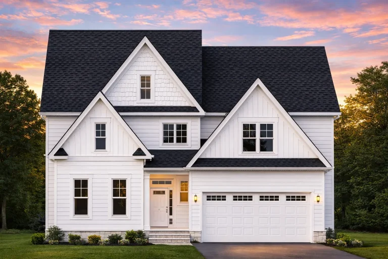 Front view of a Traditional Craftsman style house featuring horizontal siding, shingle accents, and brick wainscoting under a steep gable roof