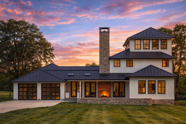 Coastal Low Country home design showcasing board and batten exterior, metal rooflines, and elevated Southern architectural character