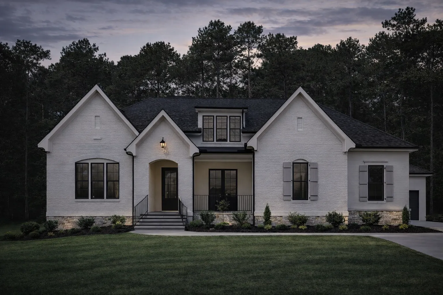Transitional Ranch House Plans 1 Front elevation of a Modern Farmhouse style home with smooth white stucco exterior, black-framed windows, gabled rooflines, and covered entry porch