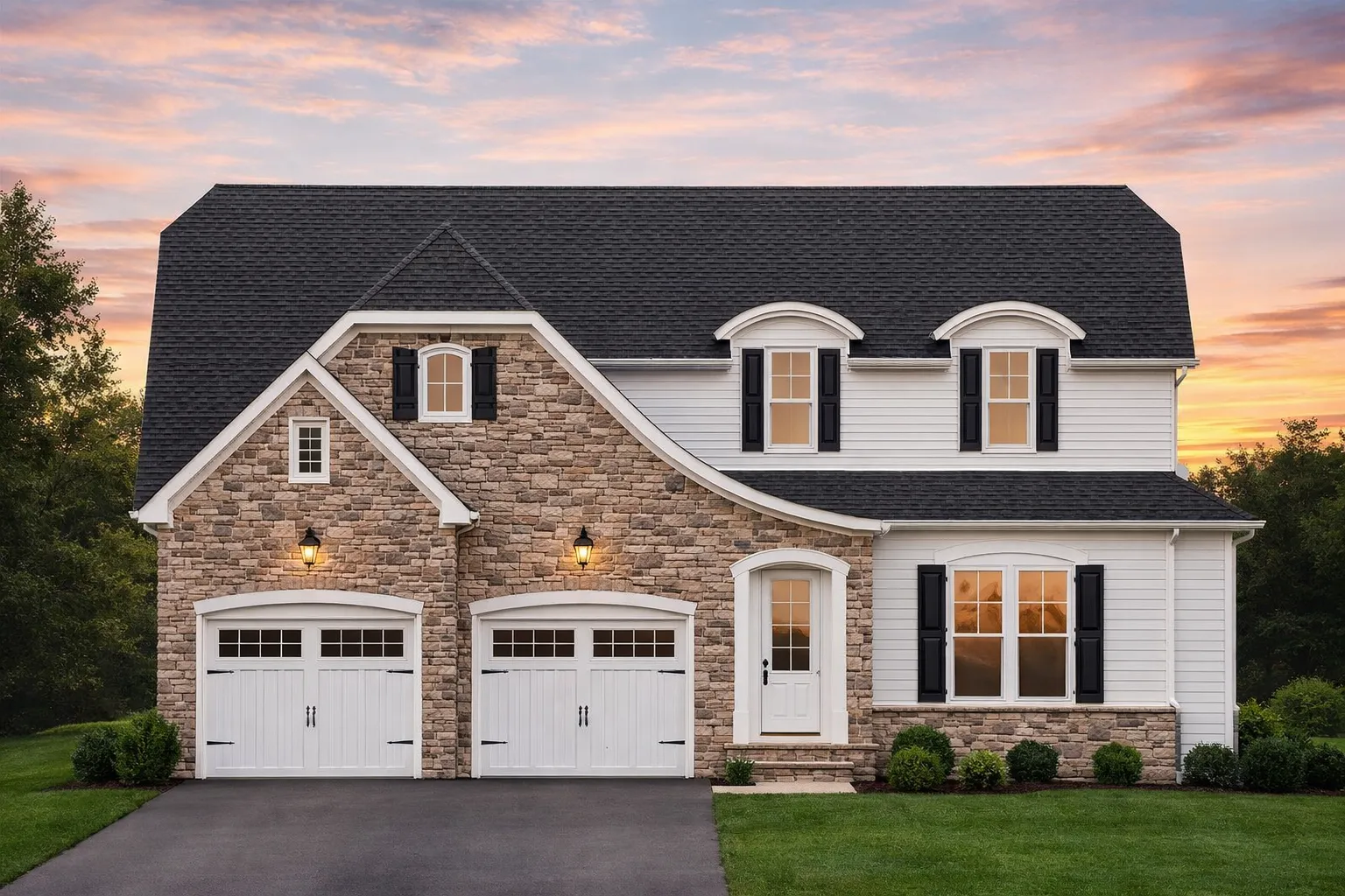 Front exterior view of a New American style house featuring stone masonry, horizontal siding, dormer windows, and a welcoming entry