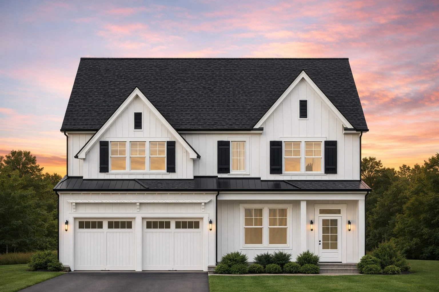 Front view of a Modern Farmhouse style two-story home featuring board and batten siding, brick accents, gable roofs, and a welcoming front porch entry