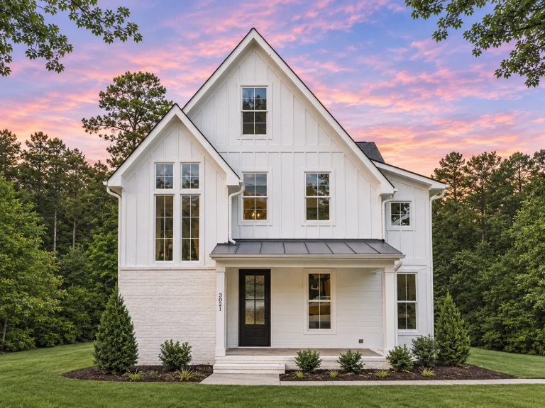 House Plans with Fireplace 12 Front elevation of a Modern Farmhouse and New American style home featuring board and batten siding, steep gable rooflines, and a welcoming covered porch