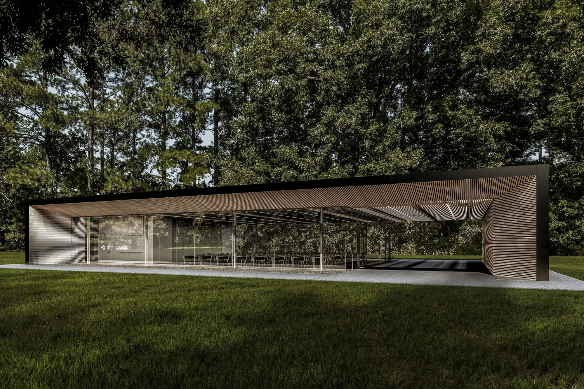 Front elevation of a contemporary modern pavilion-style home featuring exposed concrete walls, expansive glass façades, and a low-profile horizontal form set in a natural landscape