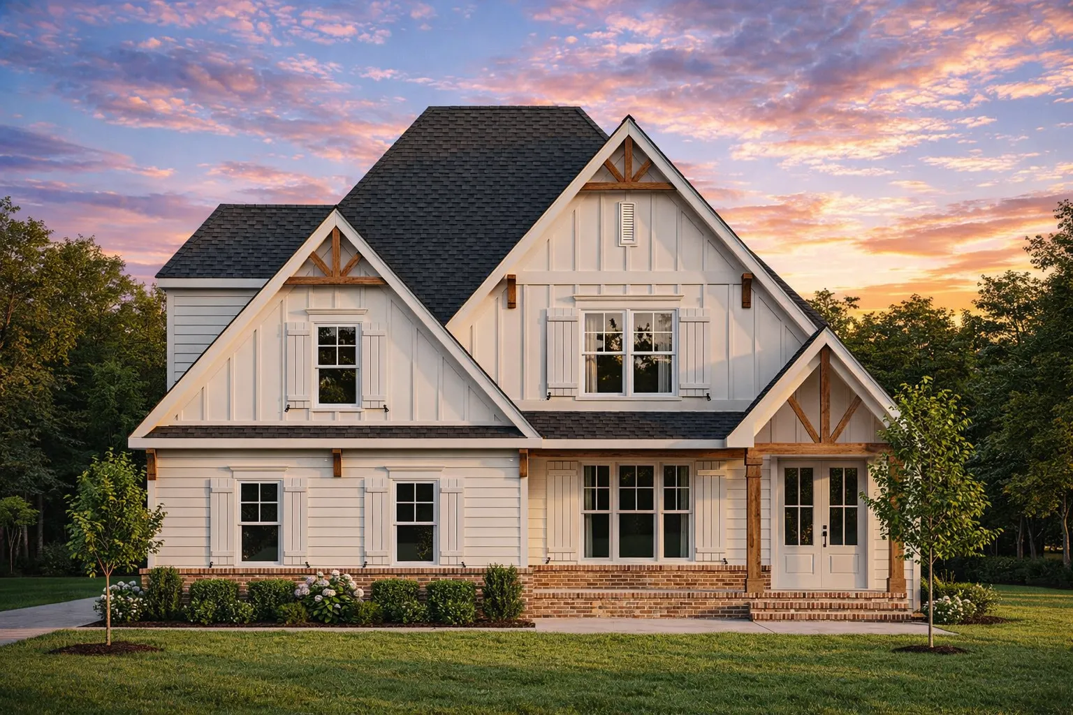 Front elevation of a Modern Farmhouse style home featuring board and batten siding, stone accents, gabled rooflines, and black window trim