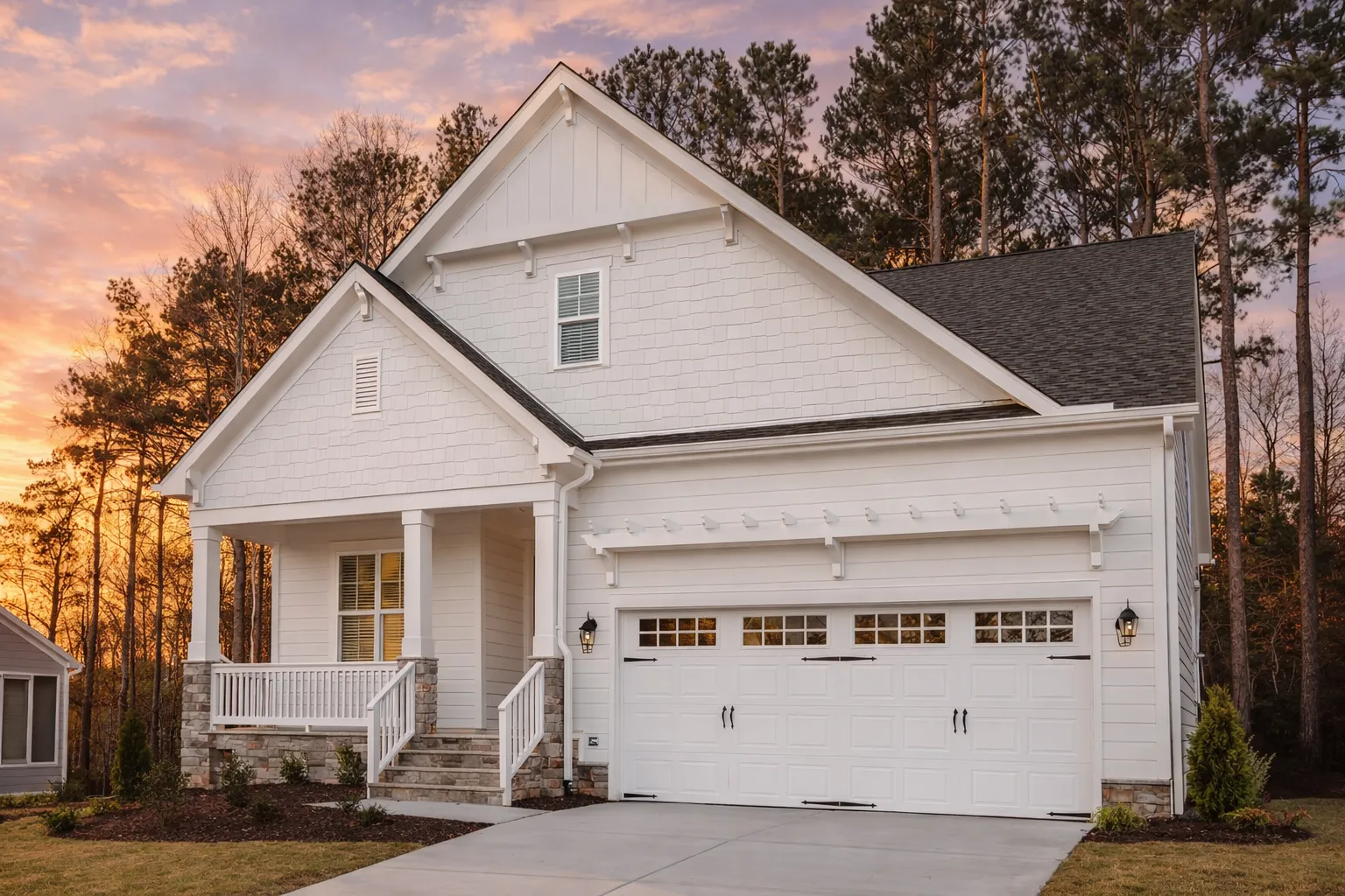 Craftsman house plan featuring board and batten siding, gable rooflines, and stone accents.