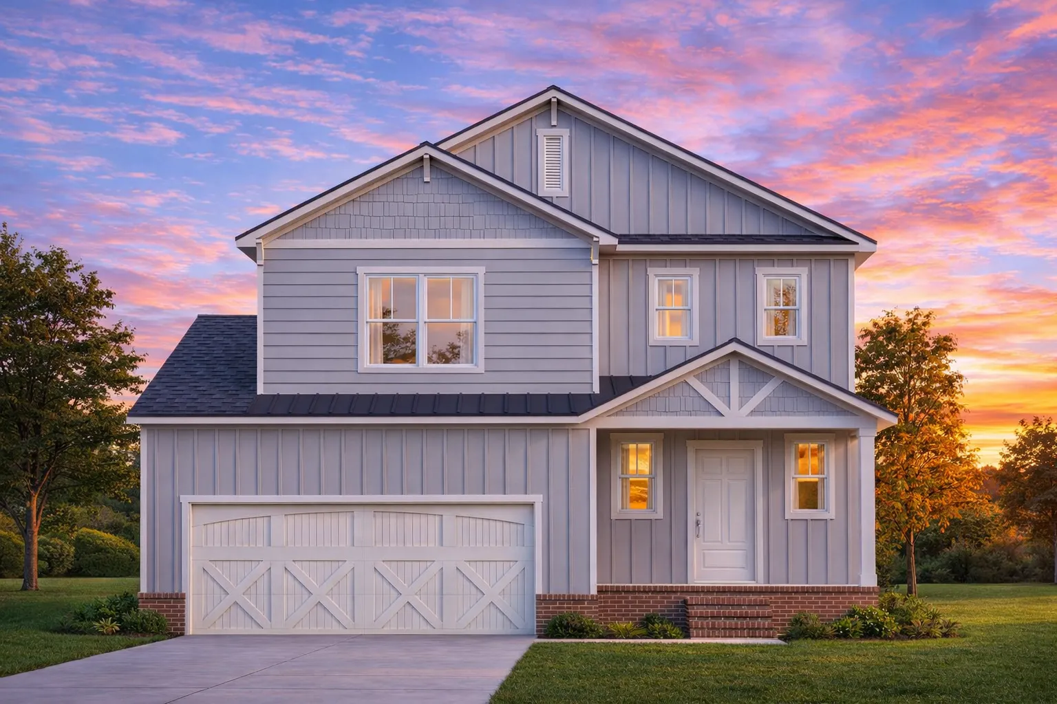 Front view of a Craftsman and New American style two-story house featuring board and batten siding, stone wainscoting, and a welcoming covered front porch with double garage.