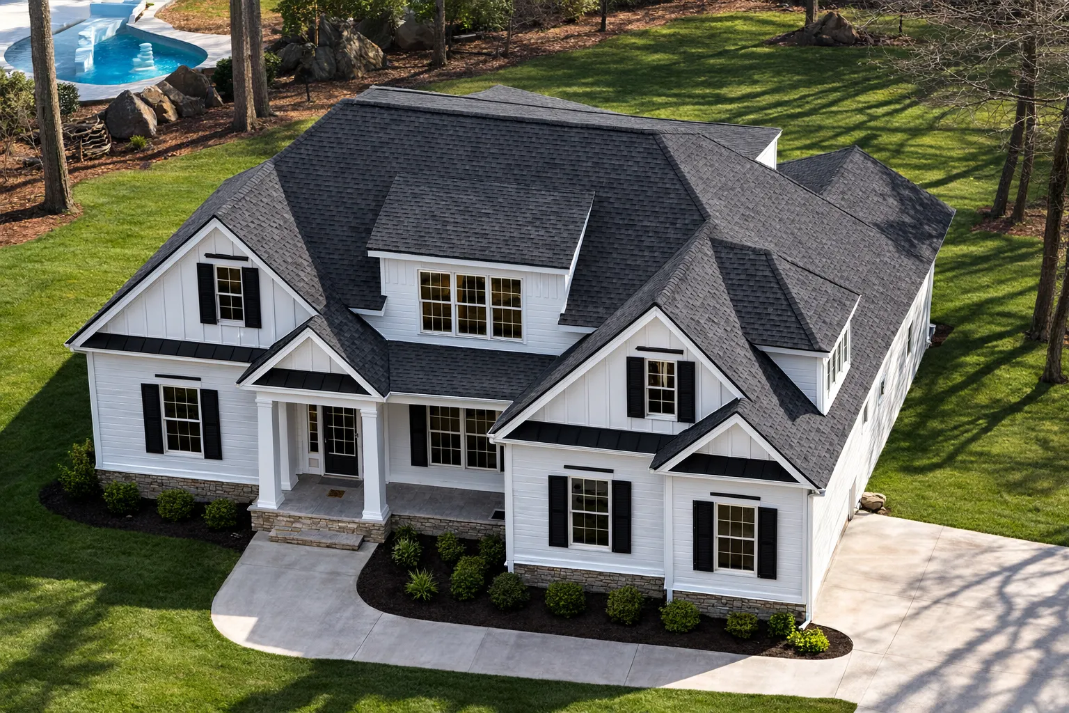 House Plans Online 29 Front elevation of a New American Traditional house with Cape Cod styling, lap siding, shingle accents, symmetrical windows, and a welcoming covered entry