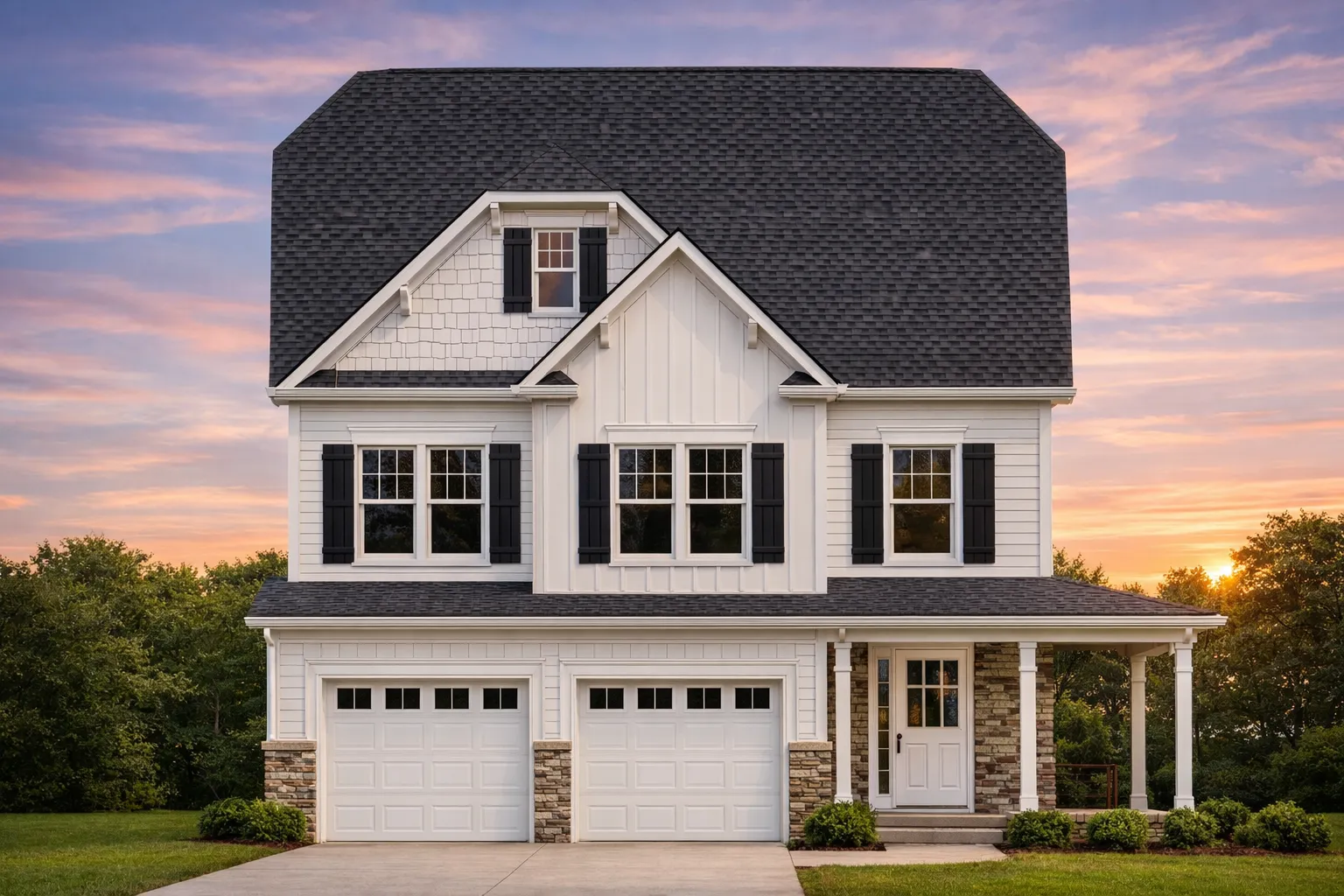 Front elevation of a Traditional Colonial style home with horizontal lap siding, symmetrical windows, covered front porch, and two-car garage