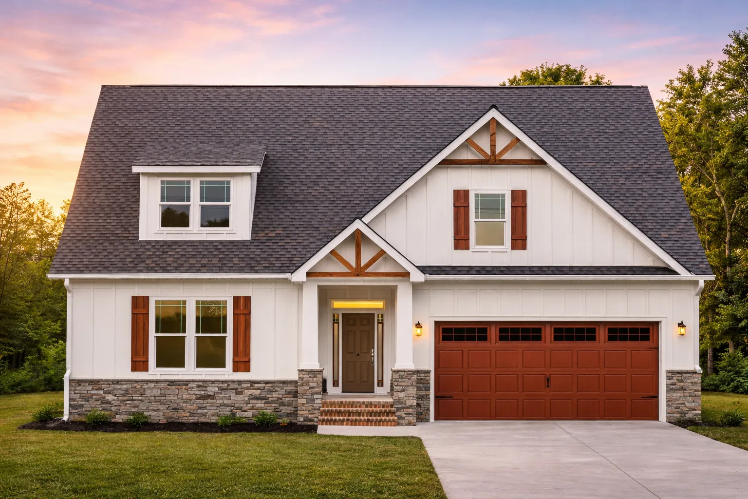 Front elevation of a Modern Farmhouse style home featuring board and batten siding, gabled roof, black garage doors, and welcoming covered porch