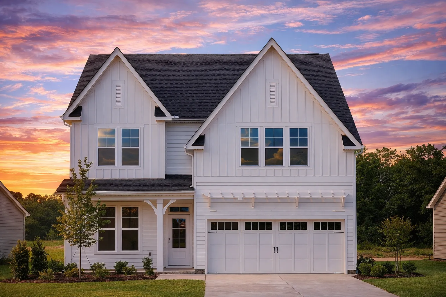 ADU House Plans 23 Front elevation of a New American modern farmhouse style home with board and batten siding, stone accents, gabled rooflines, and attached two-car garage