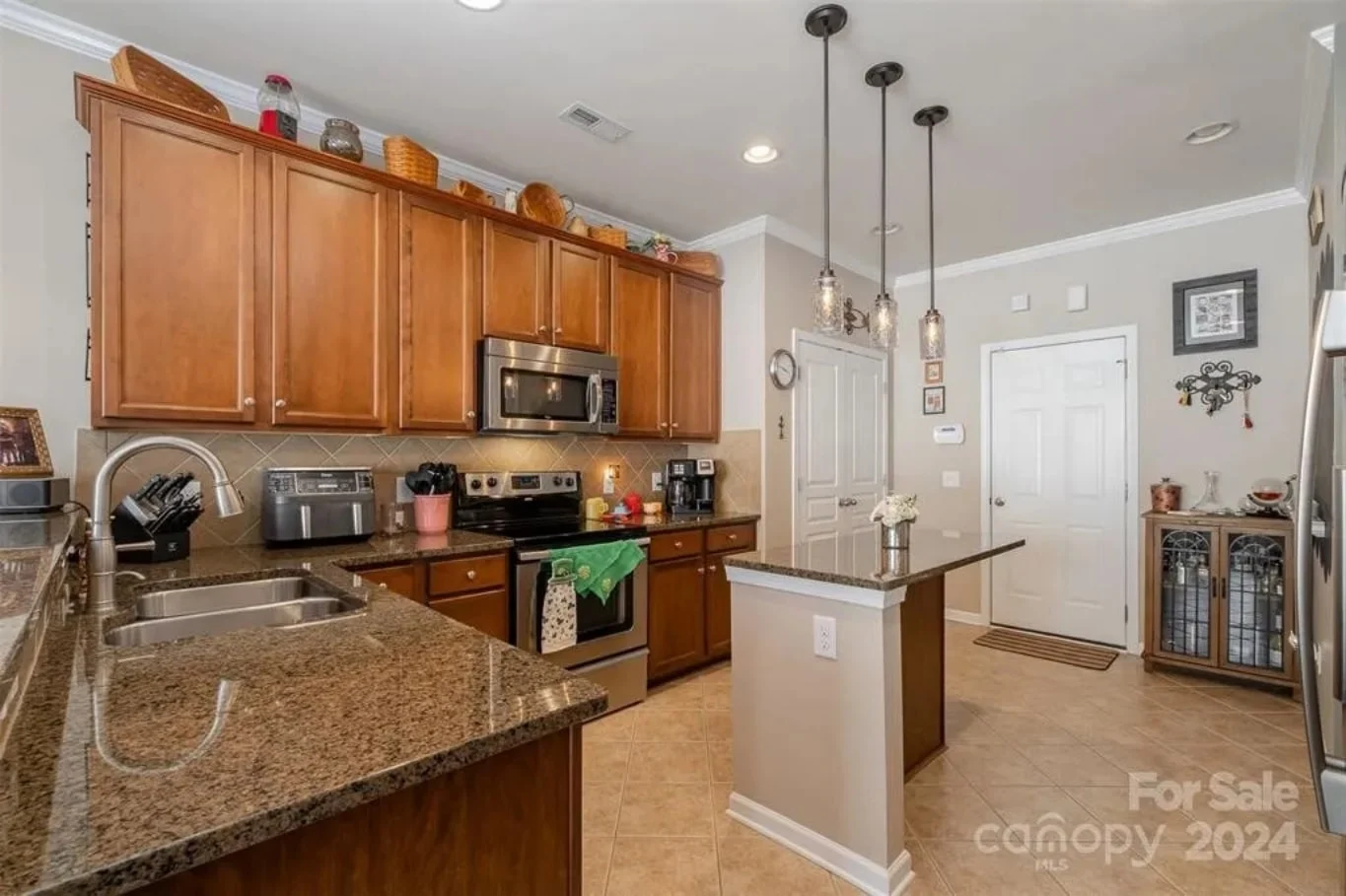 Elegant 3-Story Townhome Blueprint with Spacious Layout