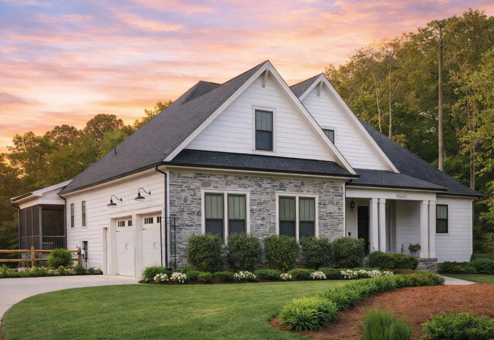 Front elevation of a Colonial Cape Cod style home with gray lap siding, brick porch foundation, shutters, and symmetrical facade
