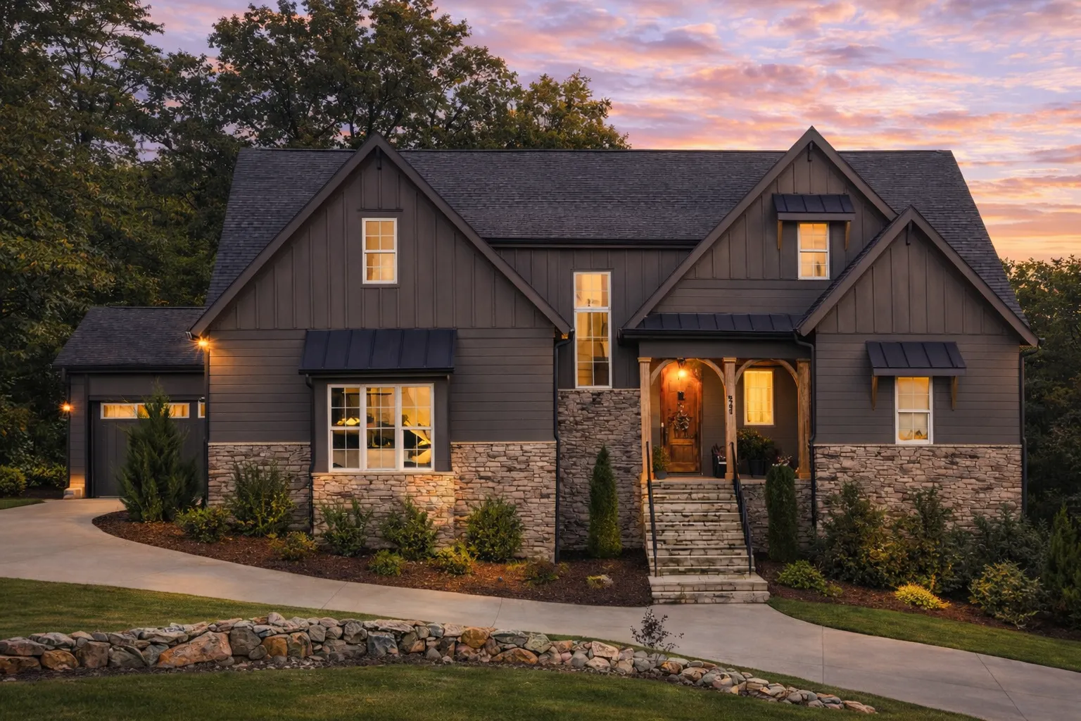 Front elevation of a Modern Craftsman house featuring board and batten siding, stone veneer base, metal awnings, and a covered entry porch