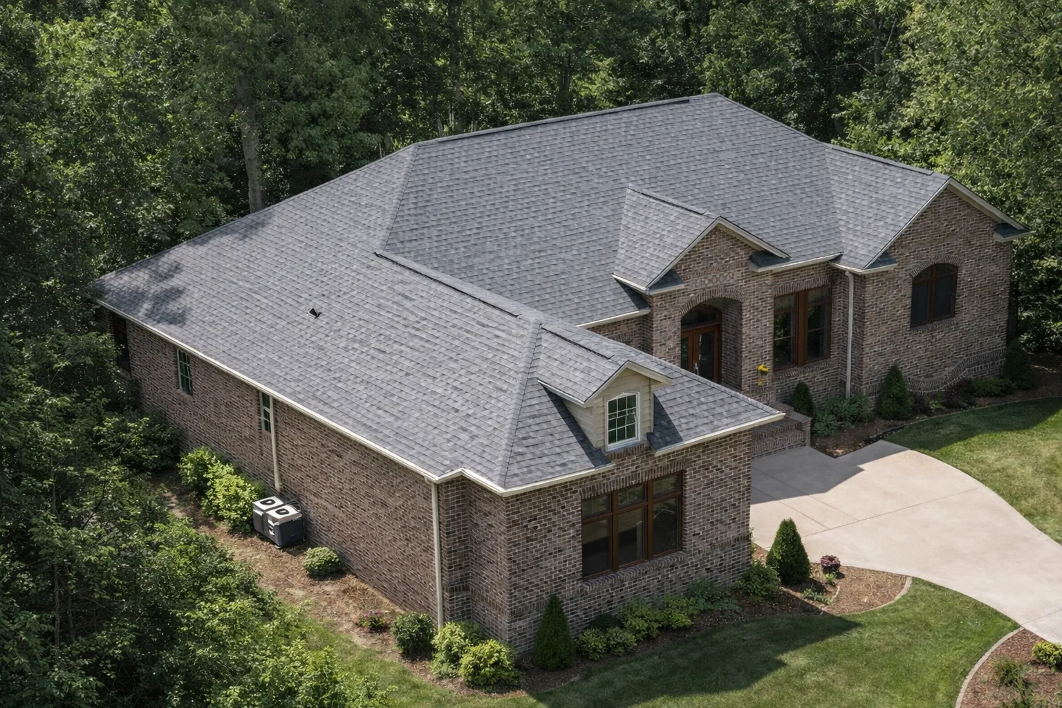 Simple House Plans 17 Front elevation of a traditional ranch-style home with brick exterior, symmetrical façade, arched entry, and manicured landscaping