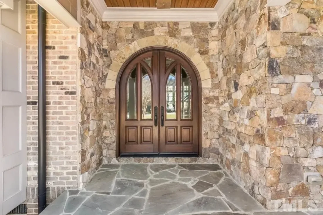 Elegant 2-Story House Plan with Vaulted Ceilings and Outdoor Living