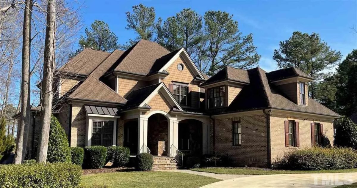 Elegant 2-Story House Plan with Vaulted Ceilings and Outdoor Living