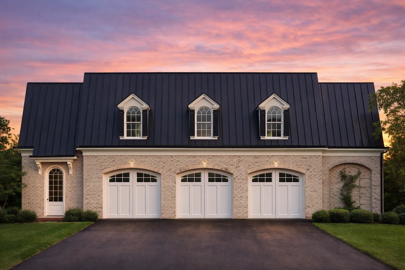 Front elevation of a Traditional Colonial style three-car garage with horizontal siding, dormer windows, and symmetrical carriage-style design