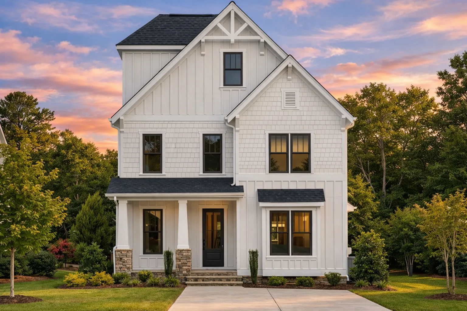 Front elevation of a Traditional Colonial style home with red brick exterior, horizontal siding accents, multi-pane windows, and a balanced two-story façade