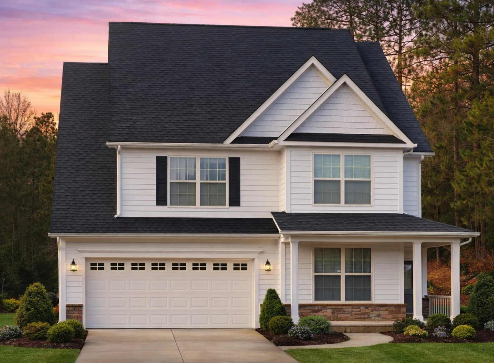 Tudor House Plans 3 Front elevation of a Traditional Colonial style home with blue horizontal siding, green shutters, gabled roof, and attached two-car garage